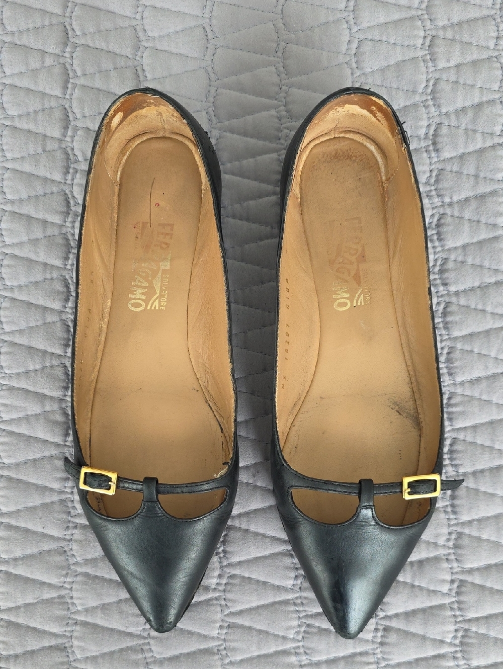Salvatore Ferragamo Black Pointed Leather Flats with Gold Buckle Accent